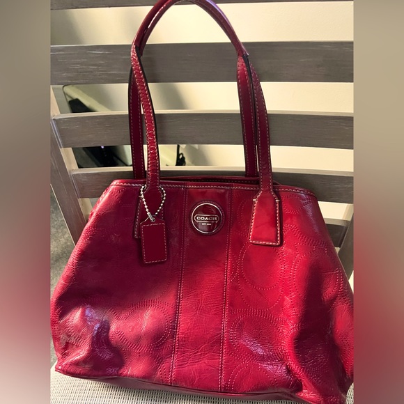 Coach Handbags - Coach purse, red with purple lining.